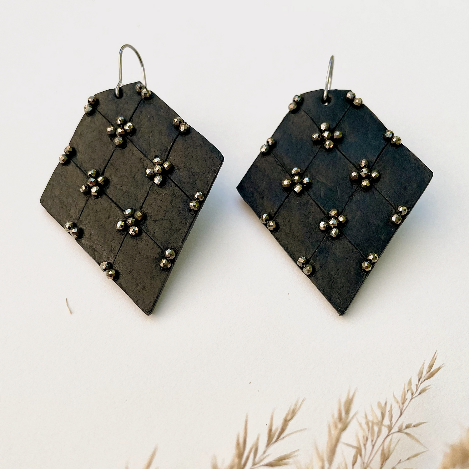 Leather and pyrite earrings