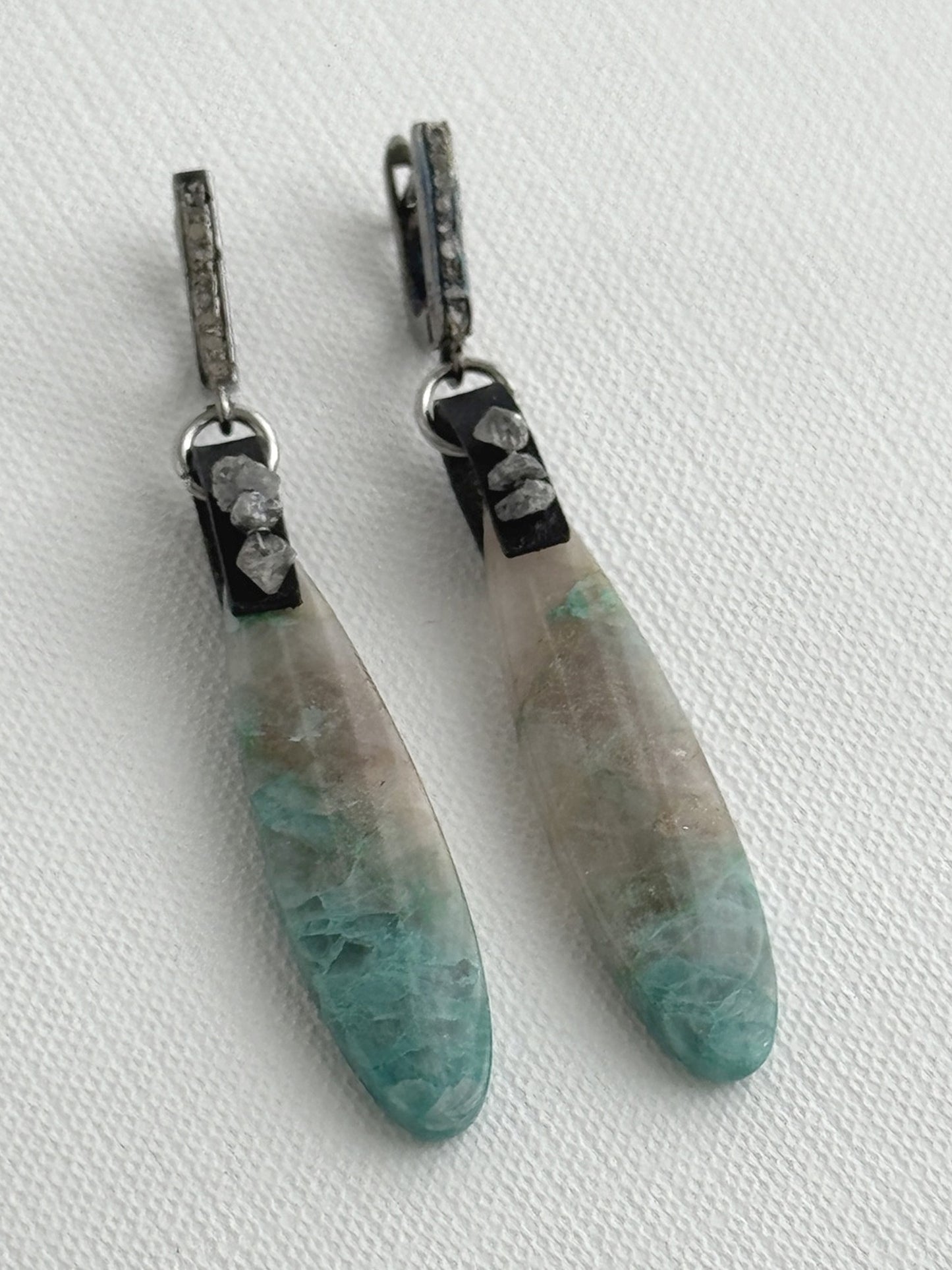 Chrysocolla in quartz teardrop earrings, angled view