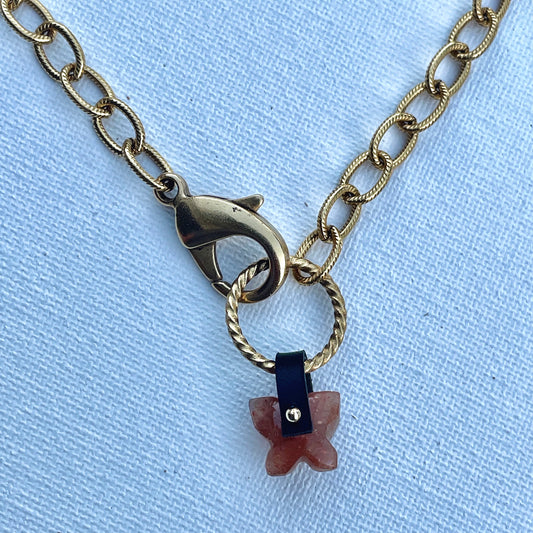 One-of-a-kind gemstone and leather charms