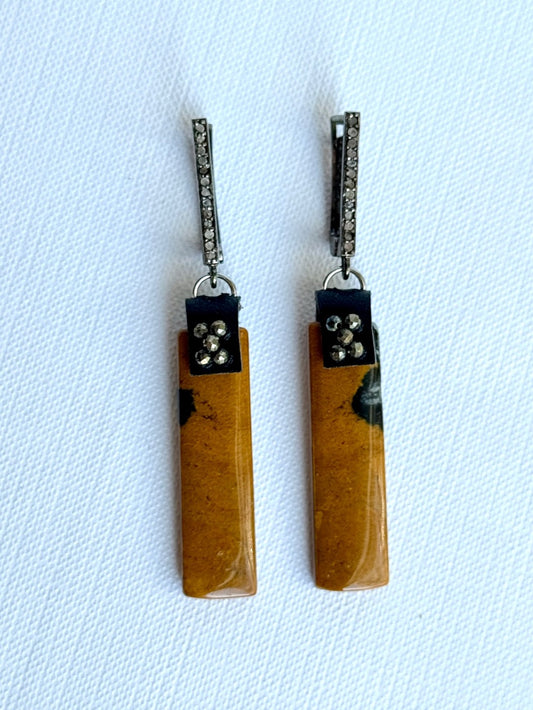 Long phantom jasper rectangle dangle earrings with five hand-sewn pyrite beads on black leather and oxidized sterling pavé diamond leverback earwires, front view