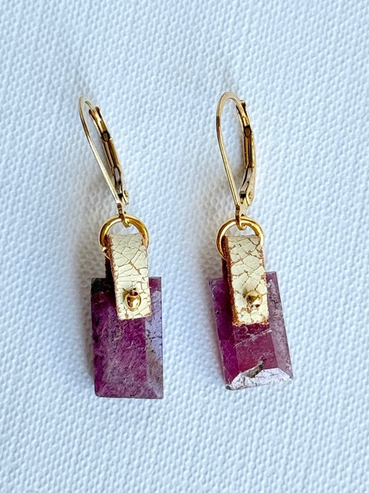 Faceted bright pink-red ruby drop earrings with a hand-sewn 14K gold-filled bead on ivory crackle leather and 14K gold-filled leverbacks, front view