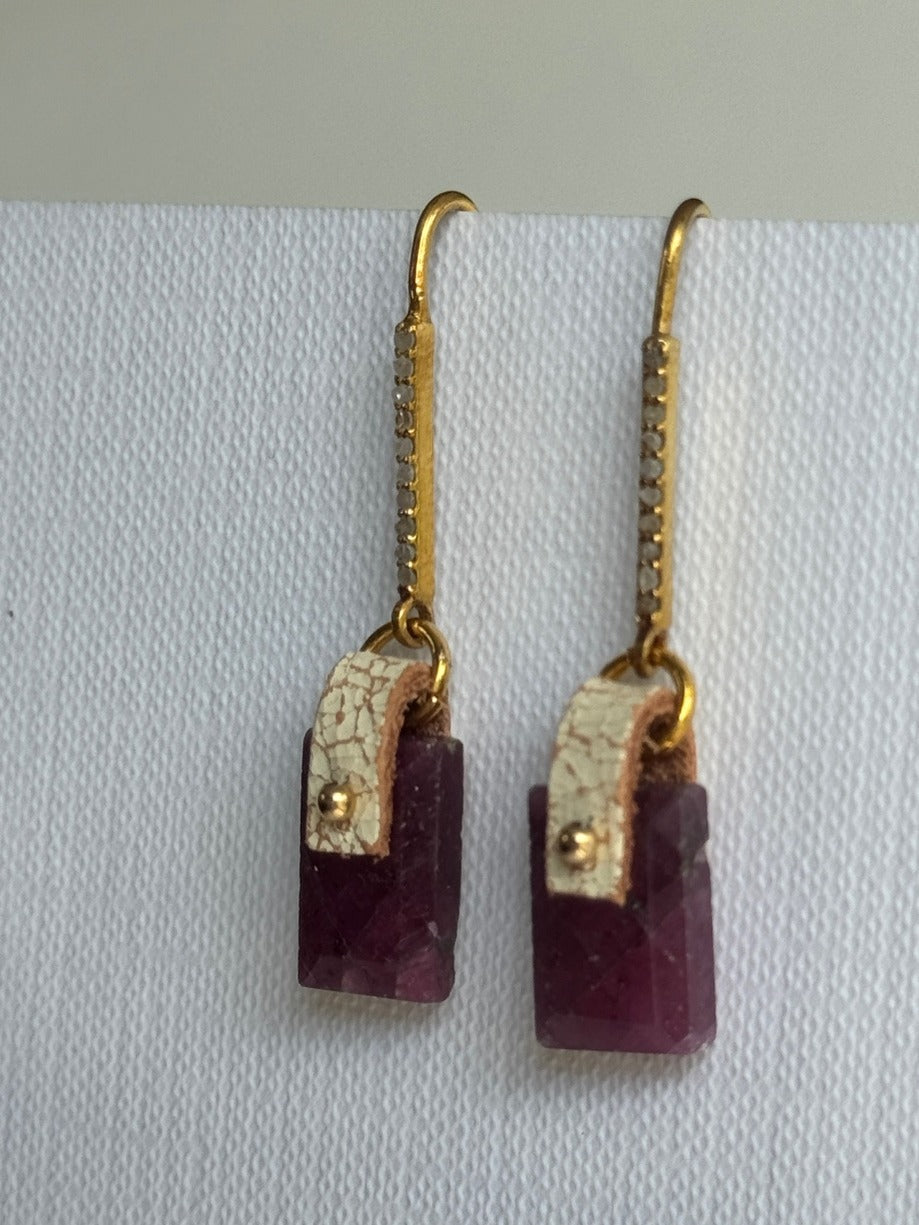 Deep pink-red faceted ruby rectangle earrings with a hand-sewn 14K gold-filled bead on ivory crackle leather and gold vermeil pavé diamond ear hooks, front view