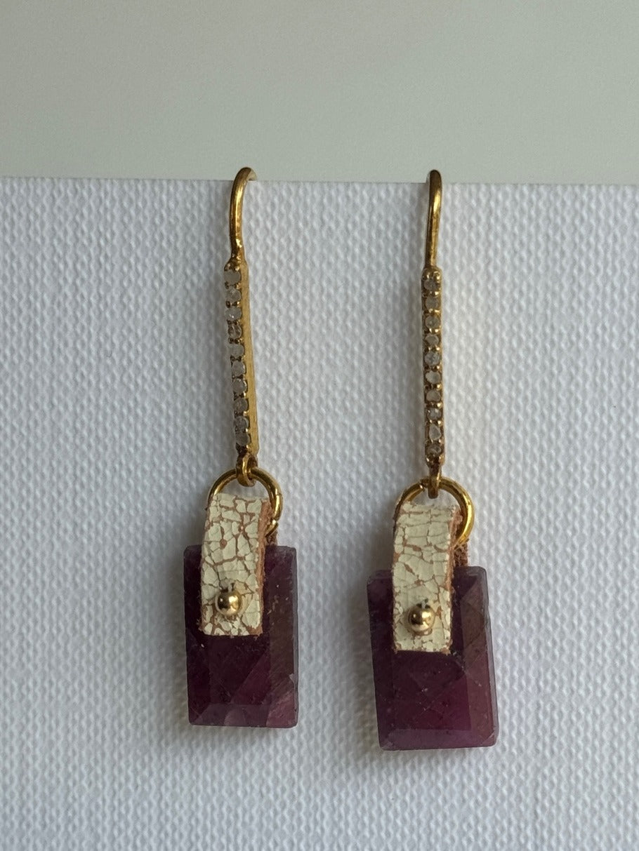 Deep pink-red faceted ruby rectangle earrings with hand-sewn 14K gold-filled beads on ivory crackle leather and gold vermeil pavé diamond ear hooks, front view