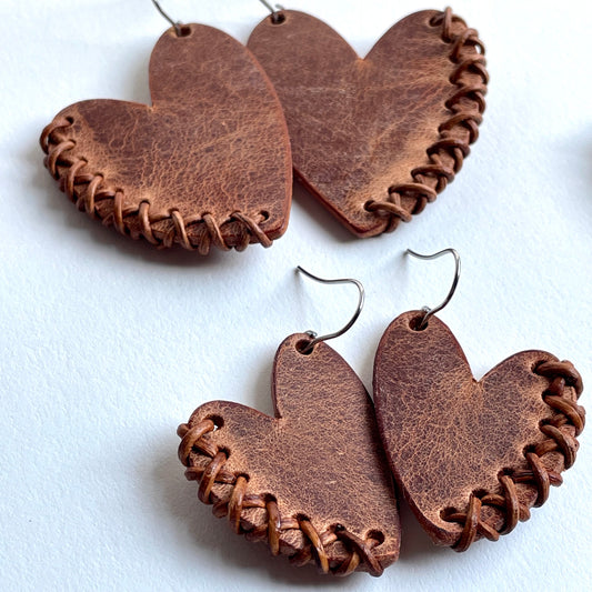leather earrings in heart shapes; heart jewelry